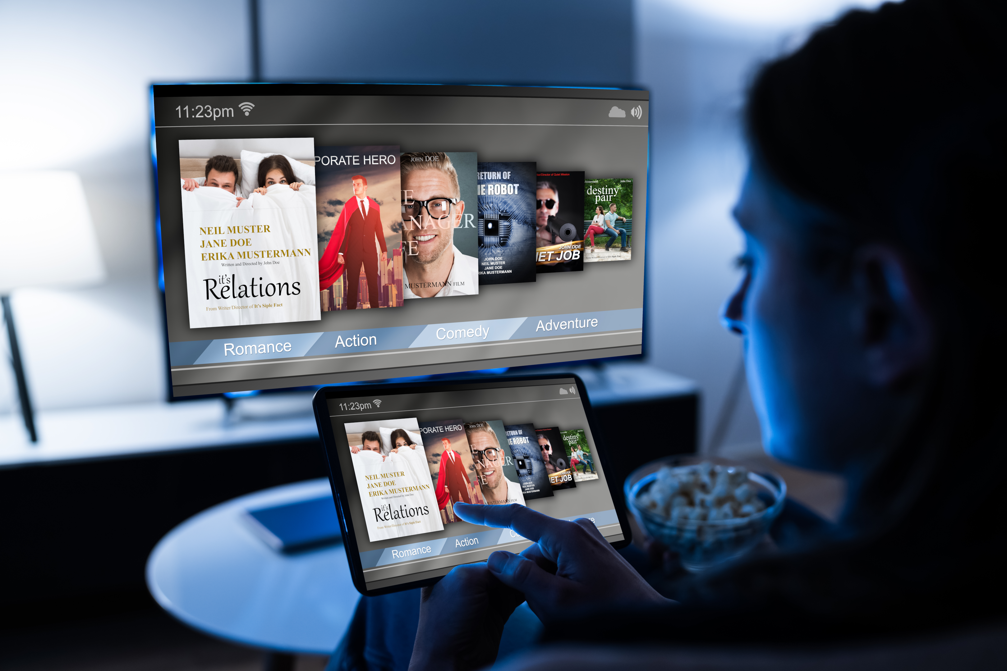 a person browses a tablet and smart tv that displays available shows on a streaming service
