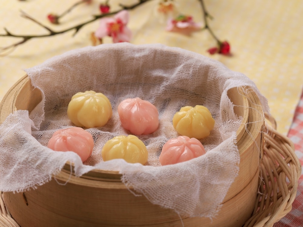 Kkultteok is Ball Shaped Rice Cake Filled with Honey and Sesame Syrup, Korean Traditional Cake for Chuseok Day. Concept Korean Culture