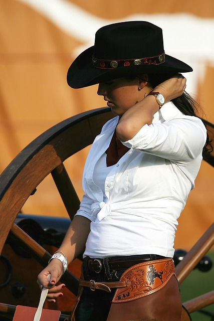 cowgirl, cowboy hat, wagon wheel
