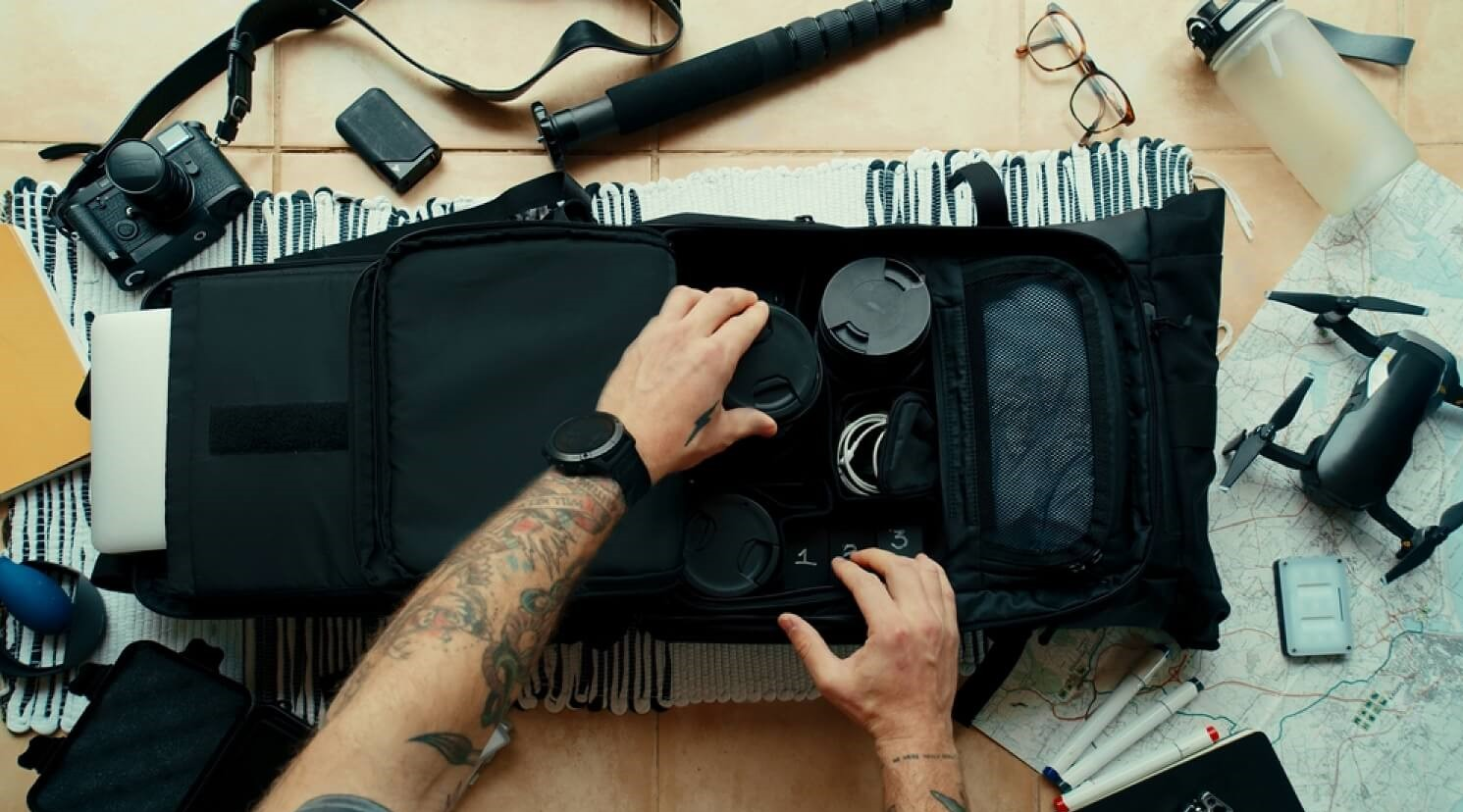 How To Travel Light With Camera Gear