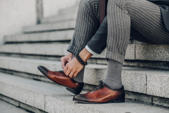 Grey colour socks wth brown shoes