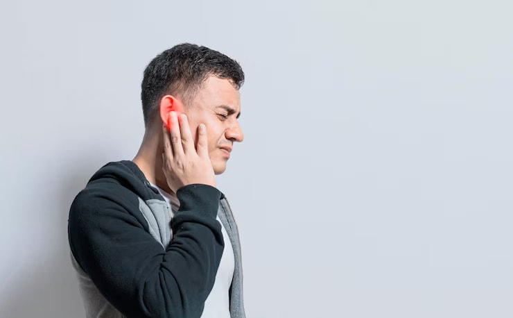 Man bothered by tinnitus sounds