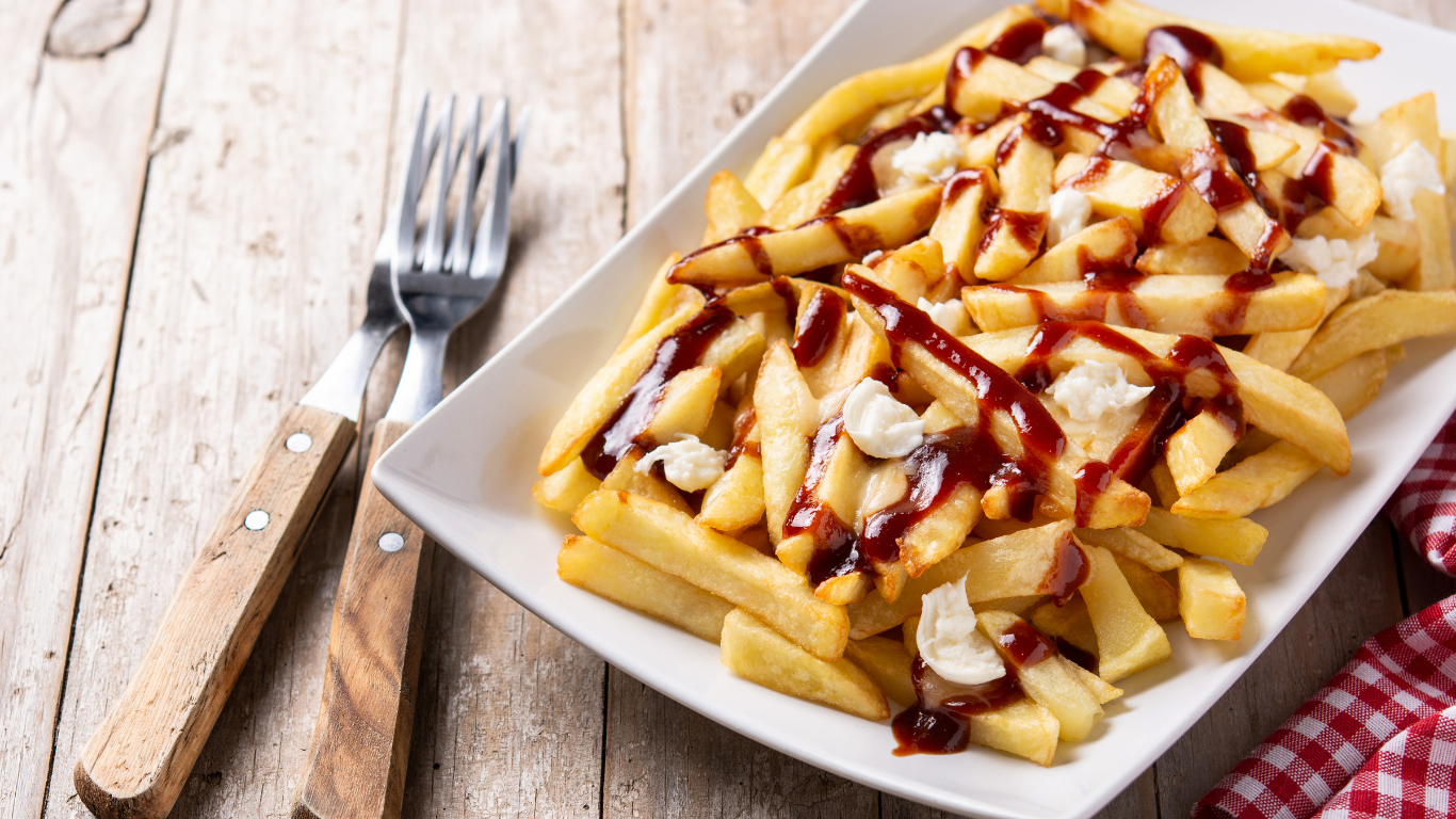 Traditional Canadian Poutine - Picture by etorres69 on Canva https://www.canva.com/photos/MAEjV1utxZ0/