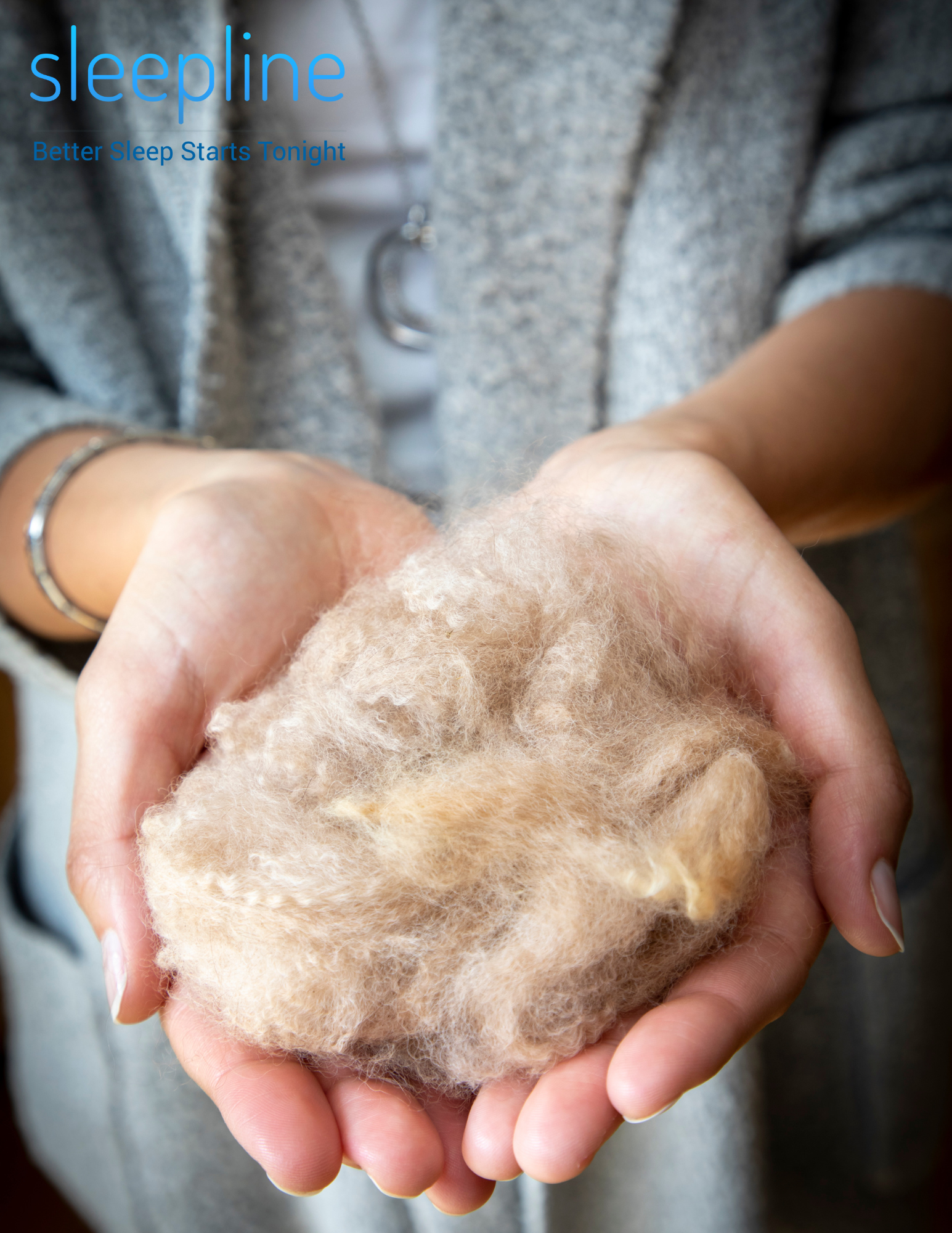 Woman holding wool from a mattress topper