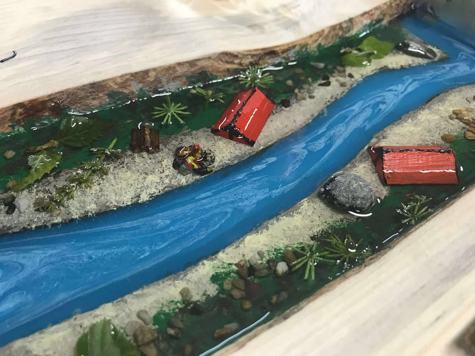An example of an epoxy river table made by John.