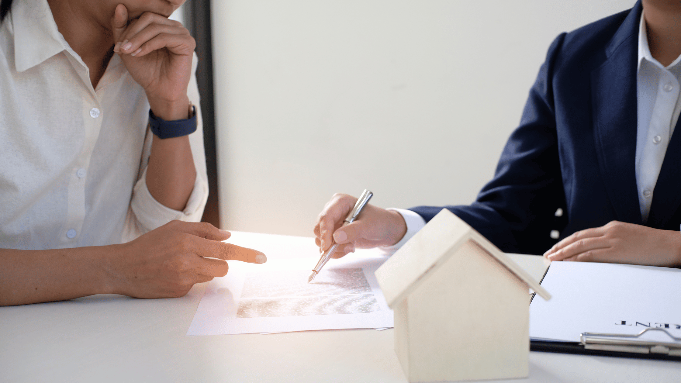 Investment property owner and property manager discussing property management.