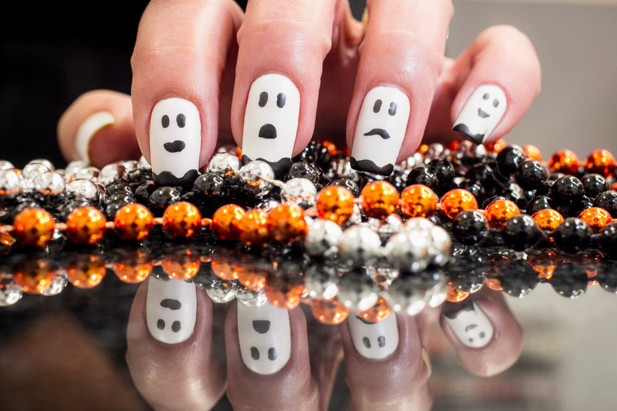 An illustration showcasing creative ghost nail art.