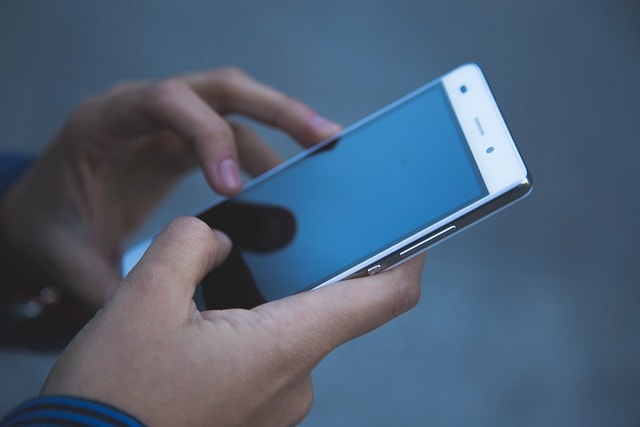 hands holding a smartphone