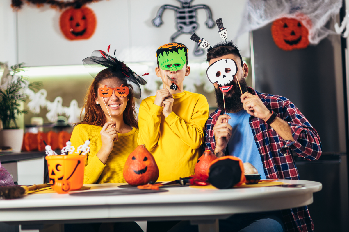 A creative DIY family Halloween costume setup with various craft materials.