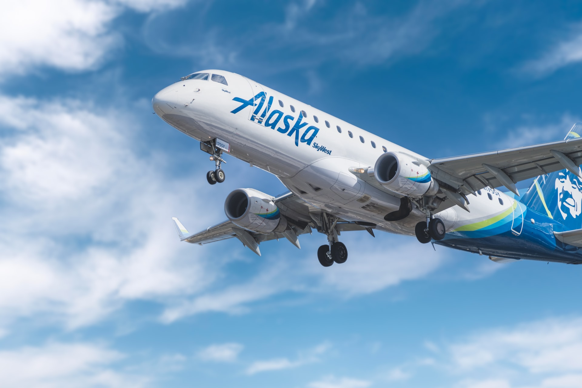 Flight phases: Alaska airlines aircraft climbing to cruise altitude.
