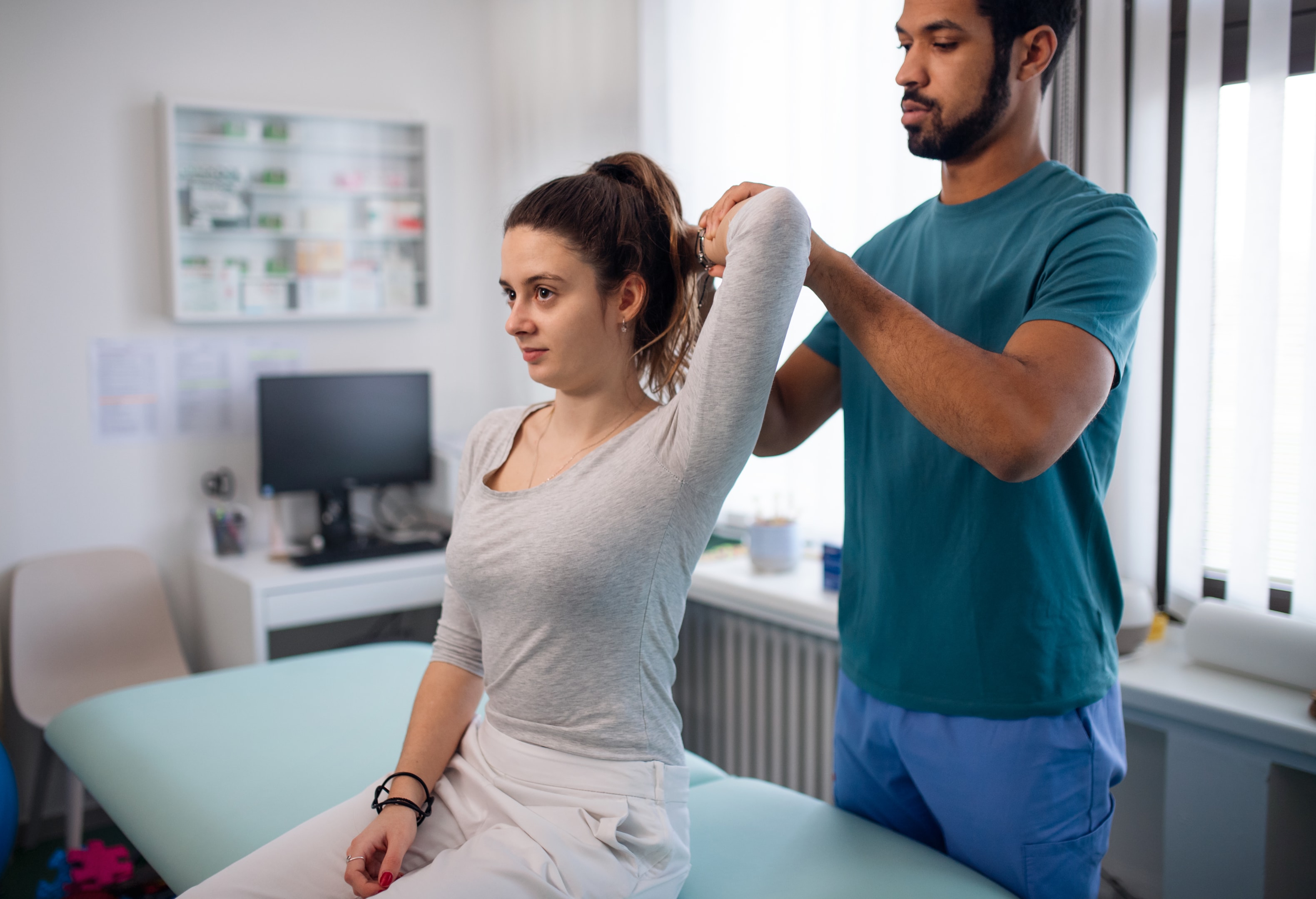 A patient booking an acupuncture appointment at the clinic.