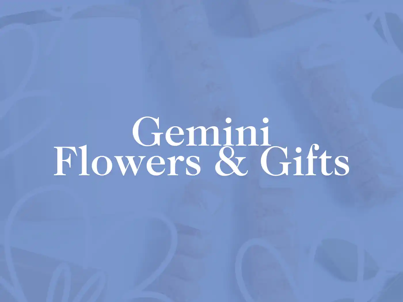 A beautiful assortment of wrapped gifts on a light blue background. Gemini Flowers & Gifts Collection. Fabulous Flowers and Gifts.