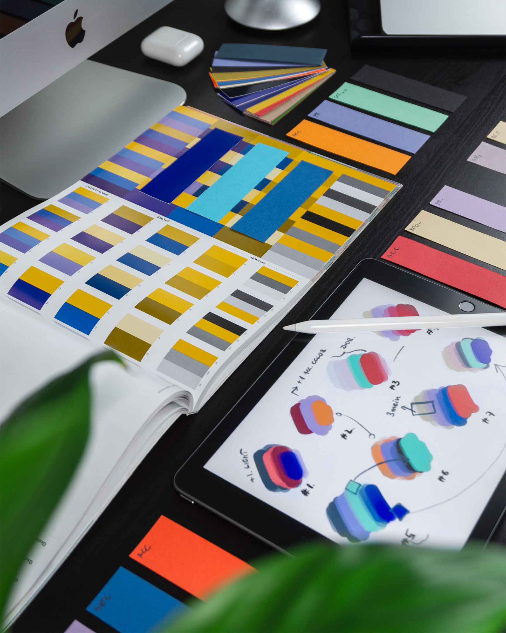 A brand designer tests out different styles and colors for a company's visual identity.