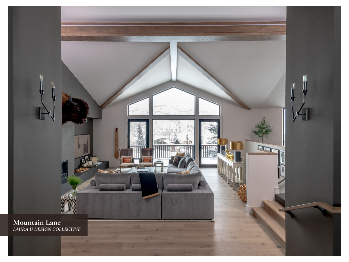 the living room in our Mountain Lane Show House project with extra seating, one of our favorite living room ideas on this list
