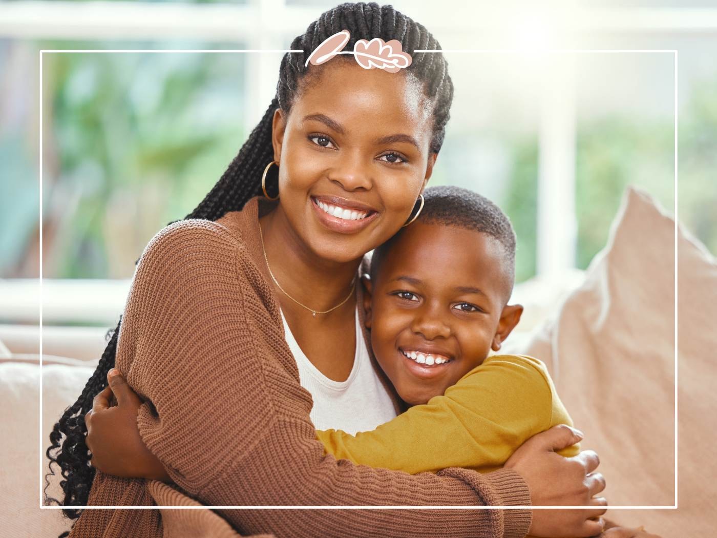 Mother and child embracing with joyful smiles, symbolising Mother’s Day love.