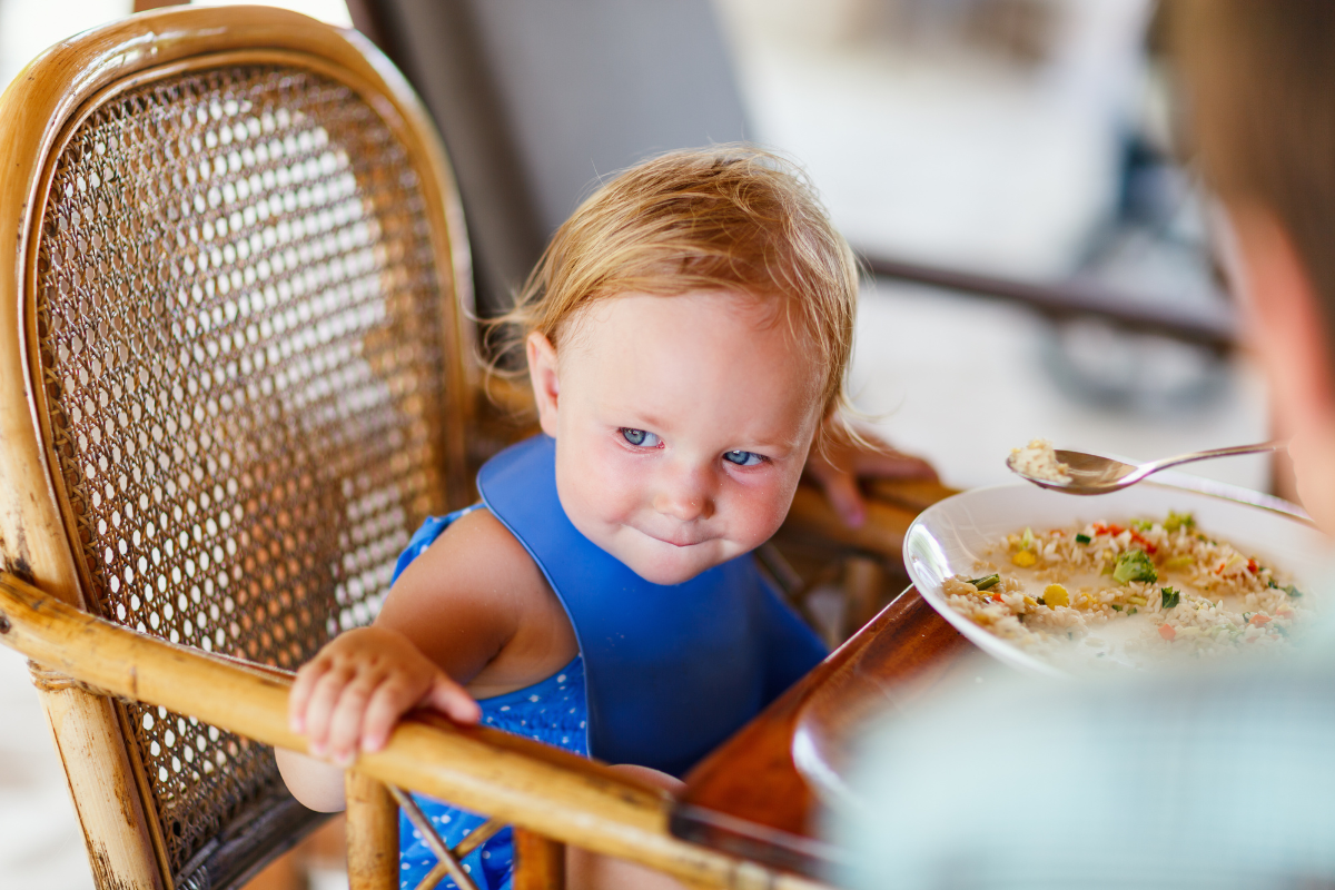 little girl eating lunch