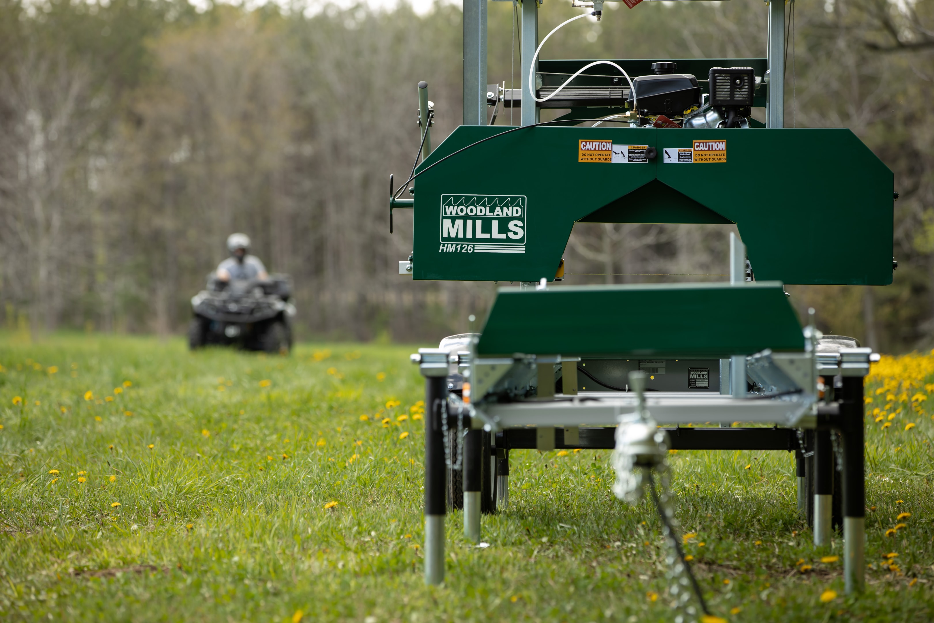 A trailer mounted Woodland Mills HM126 Portable Sawmill. 