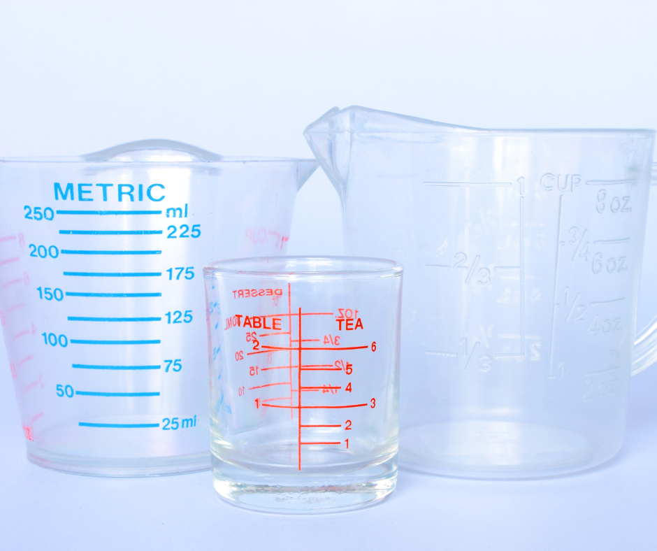 An image of a standard drink with a measuring cup, illustrating the concept of how to sober up to drive by understanding standard drink sizes.