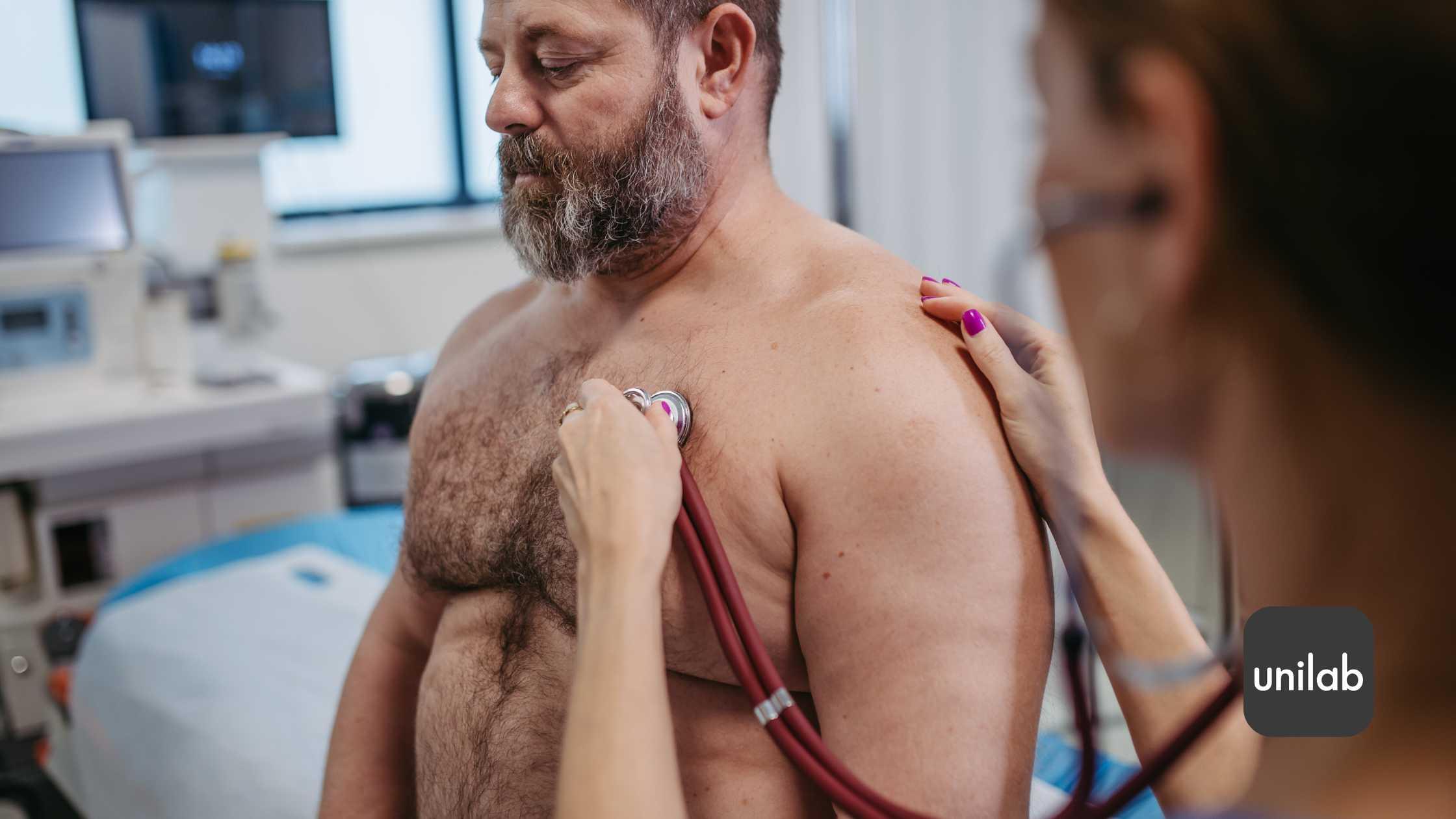 A man getting checked by a doctor