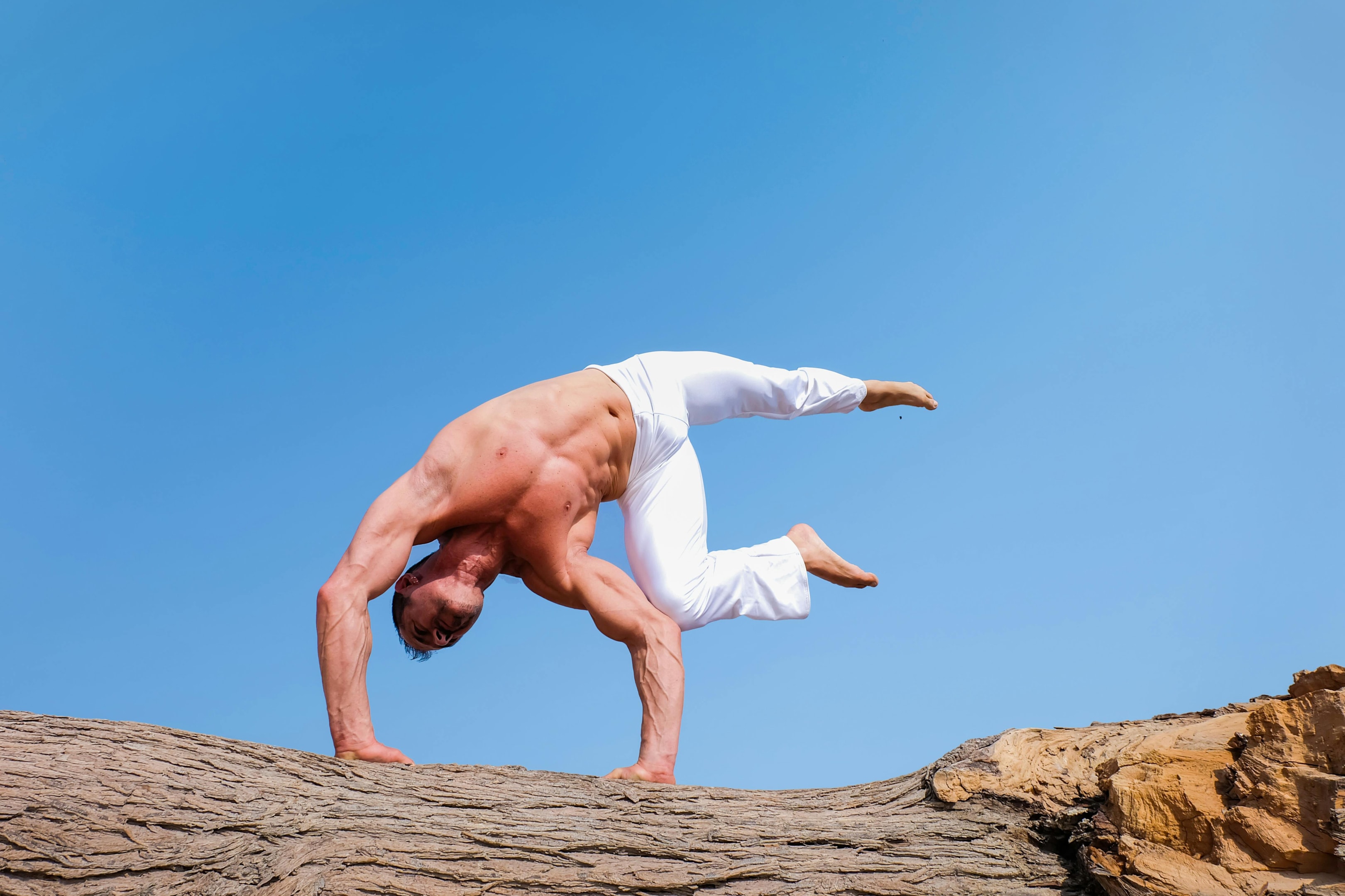 Photo by The Lazy Artist Gallery: https://www.pexels.com/photo/man-wearing-white-pants-under-blue-sky-999309/