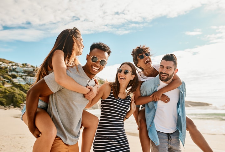 Group of friends on the beach. 