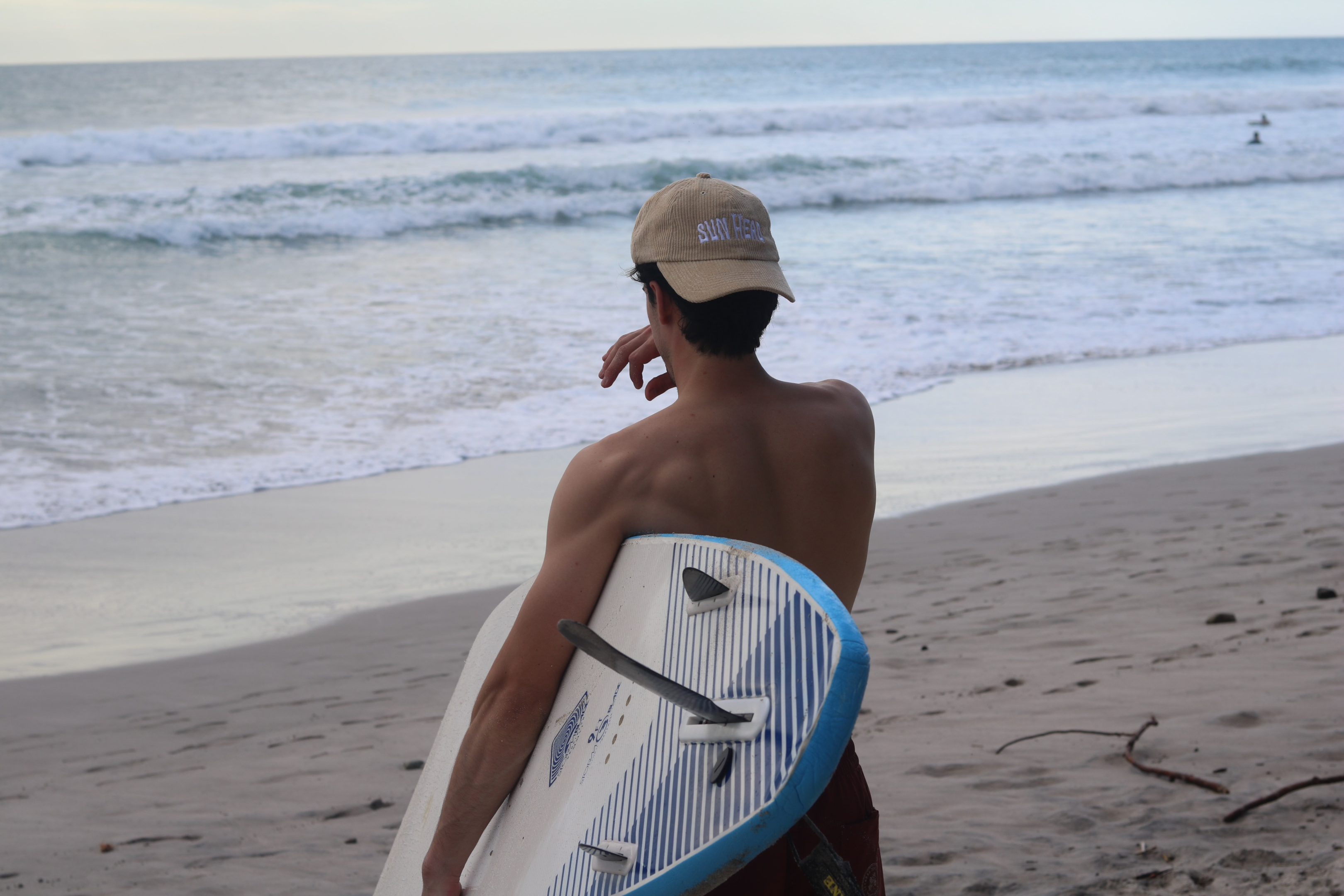 Chris and his board. Santa Teresa, Costa Rica. 