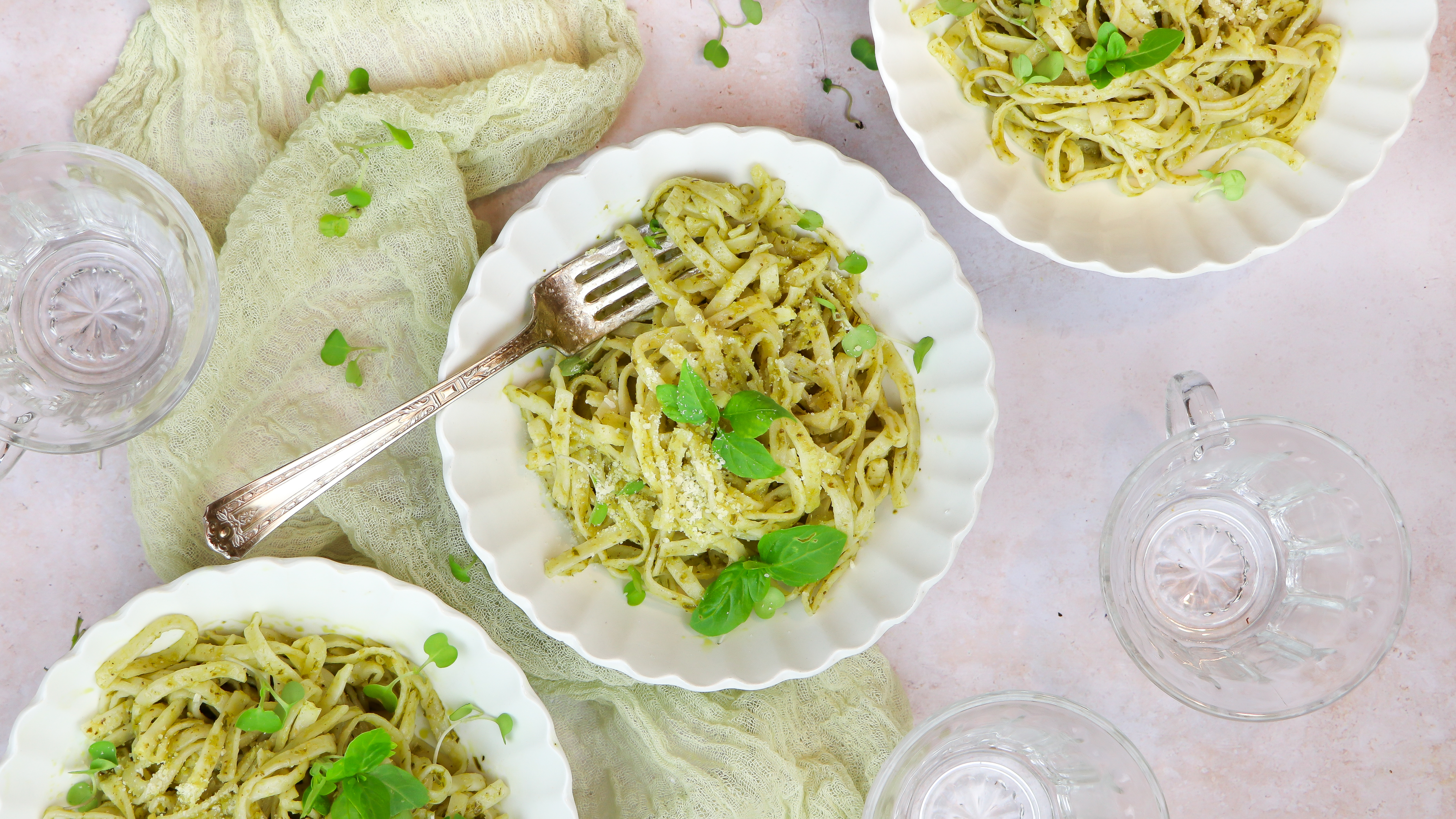 Pesto Pasta topped with microgreens and basil