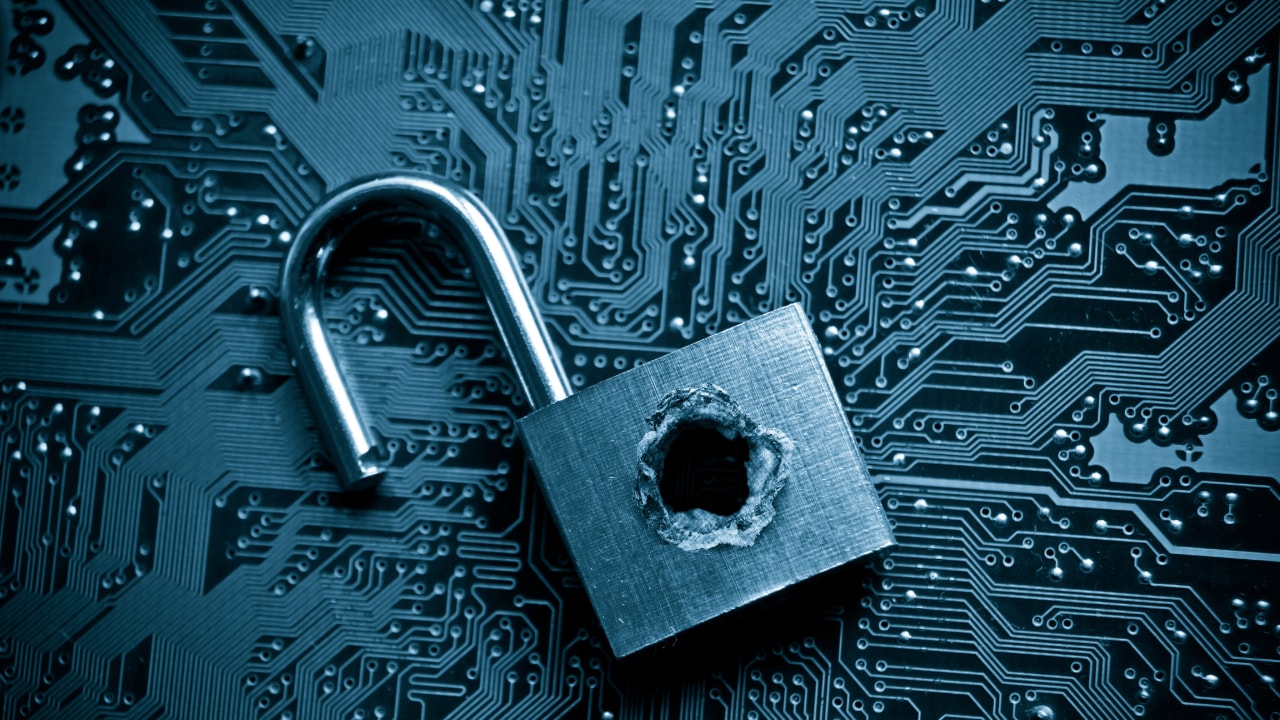 broken lock on circuit board, security threats, representation of broken account security