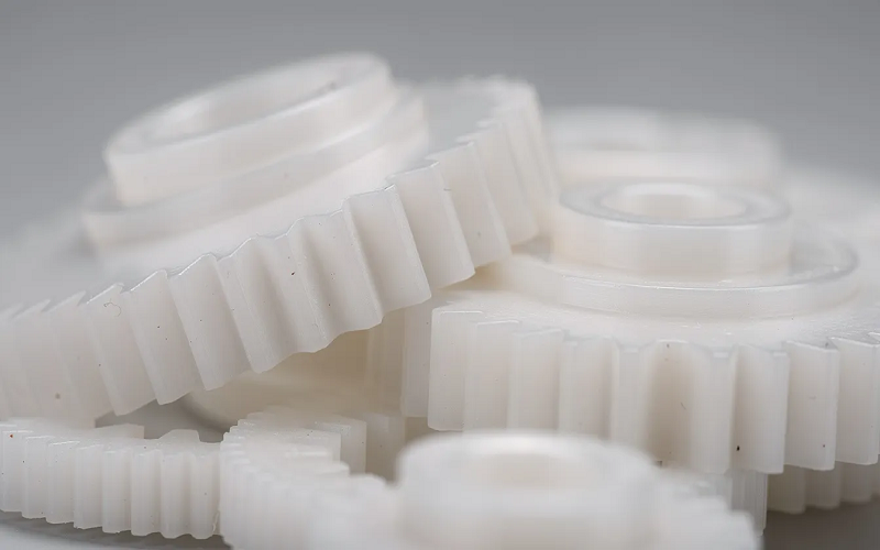 the white precision POM highlights its excellent dimensional stability and low friction performance
